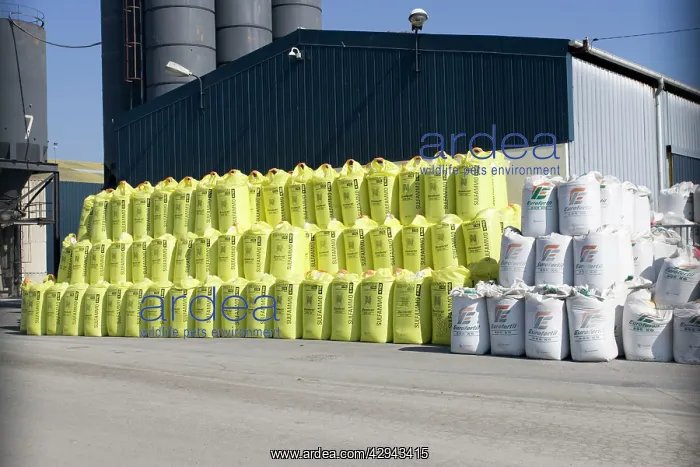 : Stacks of fertiliser sacks on dockside St Malo : Stacks of fertiliser sacks on dockside St Malo