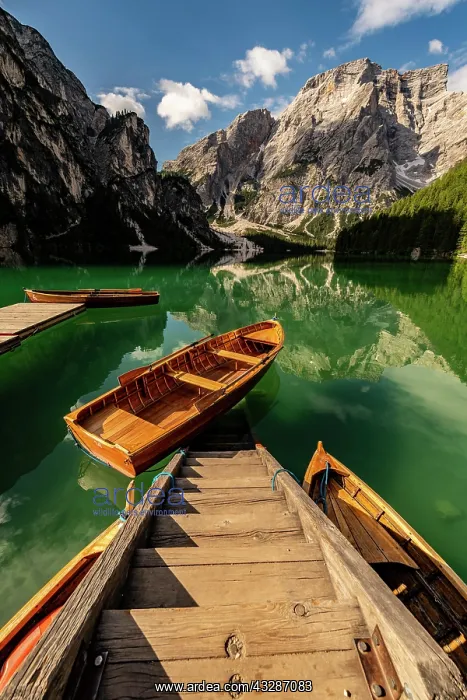 : Stairs in mountain lake with boats, Seekogel peak : Stairs in mountain lake with boats, Seekogel peak