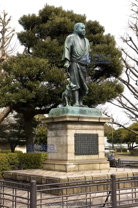 : Statue of a man with his dog Ueno Park Tokyo Japan : Statue of a man with his dog Ueno Park Tokyo Japan