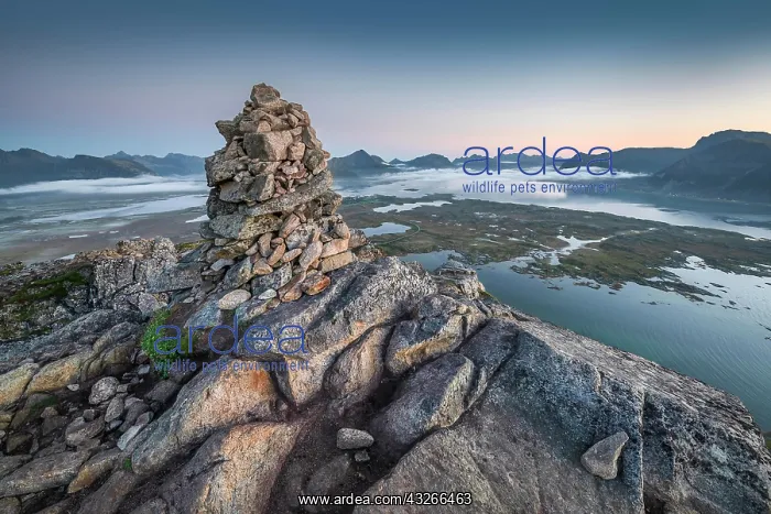 : Stone pyramid at the top of Hoven at dusk, mountains : Stone pyramid at the top of Hoven at dusk, mountains
