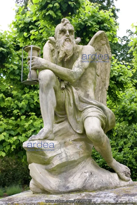 : Stone statue of old Father Time : Stone statue of old Father Time