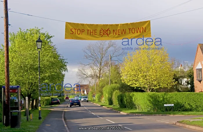 : 'Stop eco new townI banner across road : 'Stop eco new townI banner across road