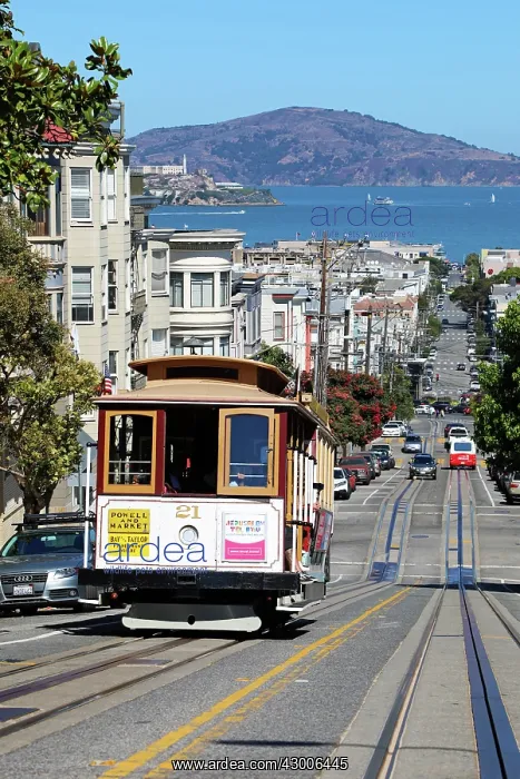 : Street scene with a Cable Car tram and Alcatraz : Street scene with a Cable Car tram and Alcatraz
