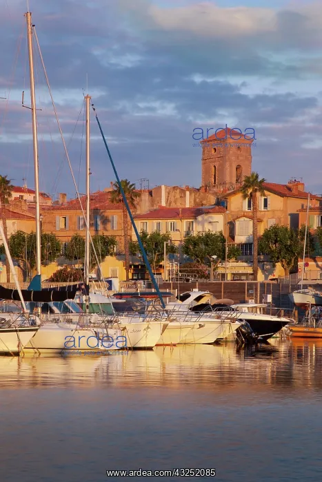 : Sunrise over the harbor of La Ciotat with : Sunrise over the harbor of La Ciotat with