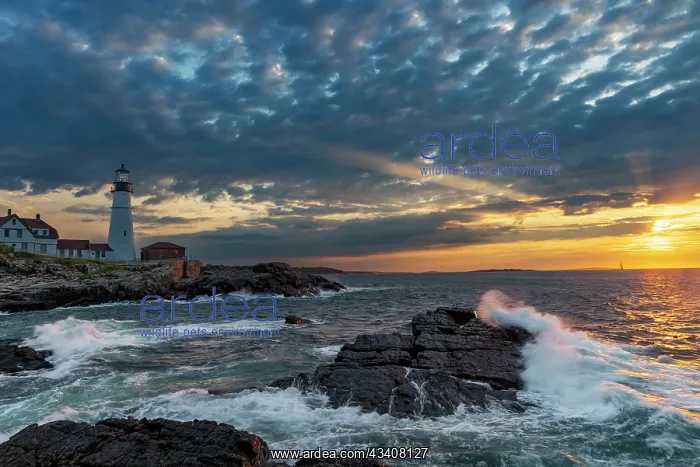 : Sunrise at Portland Head Lighthouse in Portland, Maine, USA : Sunrise at Portland Head Lighthouse in Portland, Maine, USA