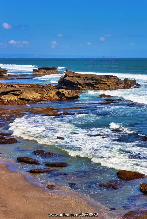 : Sunset at rocky shoreline of Love Beach : Sunset at rocky shoreline of Love Beach