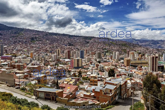 : Sweeping city view with hilly landscape and clouds : Sweeping city view with hilly landscape and clouds