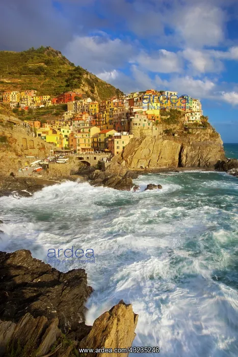 : Swirling ocean at the foot of medieval town : Swirling ocean at the foot of medieval town