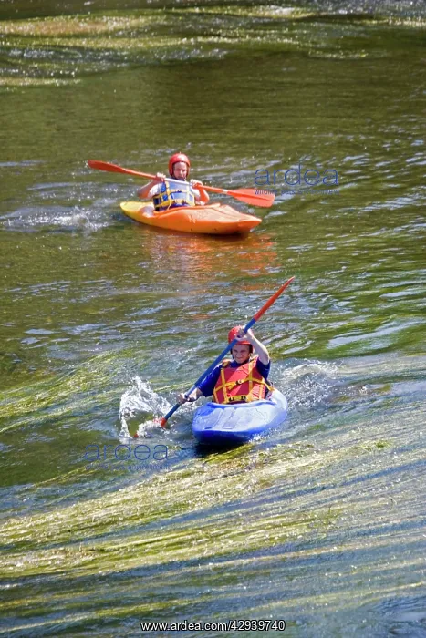 : Teenage boys paddling canoes down River Wye, Lower : Teenage boys paddling canoes down River Wye, Lower