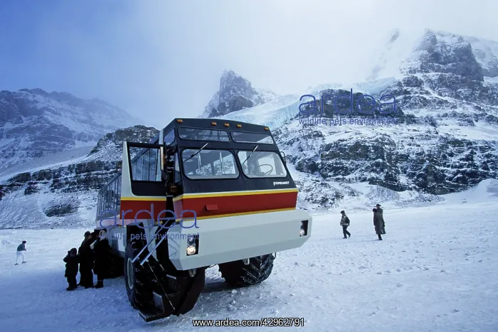 : Tourists on the Athabasca Glacier by snow vehicle : Tourists on the Athabasca Glacier by snow vehicle