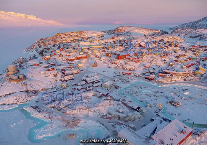 : Town Uummannaq during winter in northern West Greenland : Town Uummannaq during winter in northern West Greenland