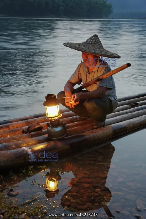 : Traditional fisherman with lantern at sunset : Traditional fisherman with lantern at sunset