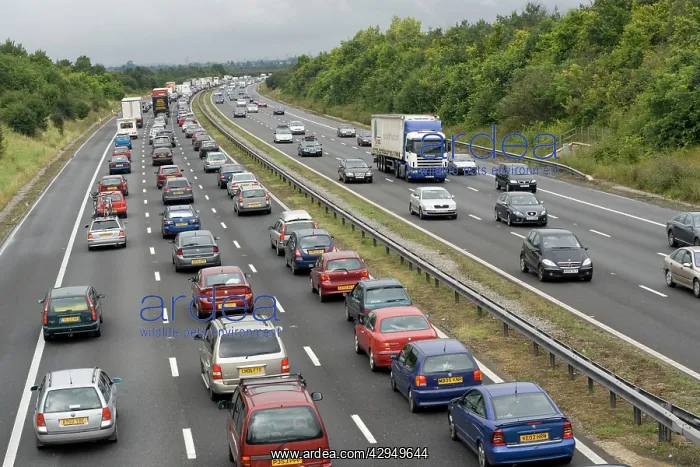 : Traffic queues on busy M5 motorway after torrential : Traffic queues on busy M5 motorway after torrential