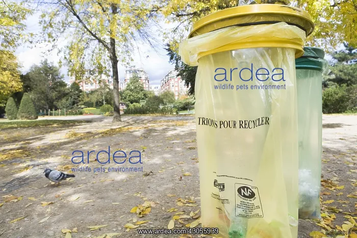 : Trash for recyclable waste in a square in Paris : Trash for recyclable waste in a square in Paris
