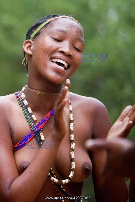 : Tribal Dancer - Bushmen Girl dancing in Manghetti dunes : Tribal Dancer - Bushmen Girl dancing in Manghetti dunes