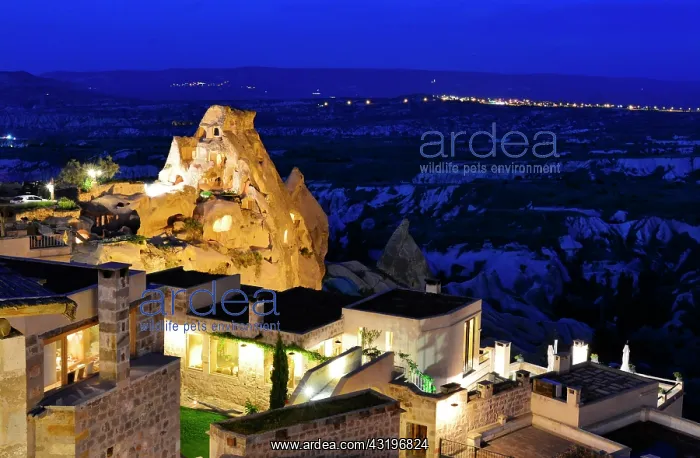 : Turkey. Cappadocia. Uchisar. Built around two rocky : Turkey. Cappadocia. Uchisar. Built around two rocky