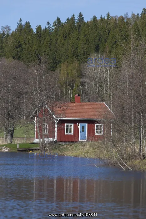 : Typical swedish hut at a river - Vaermland, Sweden : Typical swedish hut at a river - Vaermland, Sweden