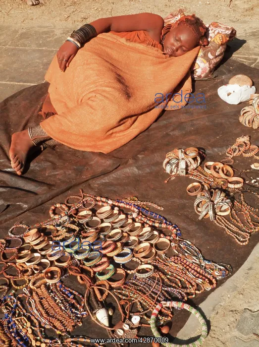 : The unusual sight of a Himba woman in the seaside : The unusual sight of a Himba woman in the seaside