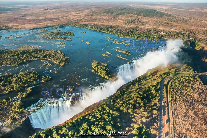 : The Victoria falls is the largest curtain of wat : The Victoria falls is the largest curtain of wat
