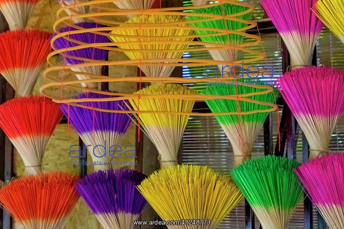 : Vietnam. Colorful incense for sale : Vietnam. Colorful incense for sale