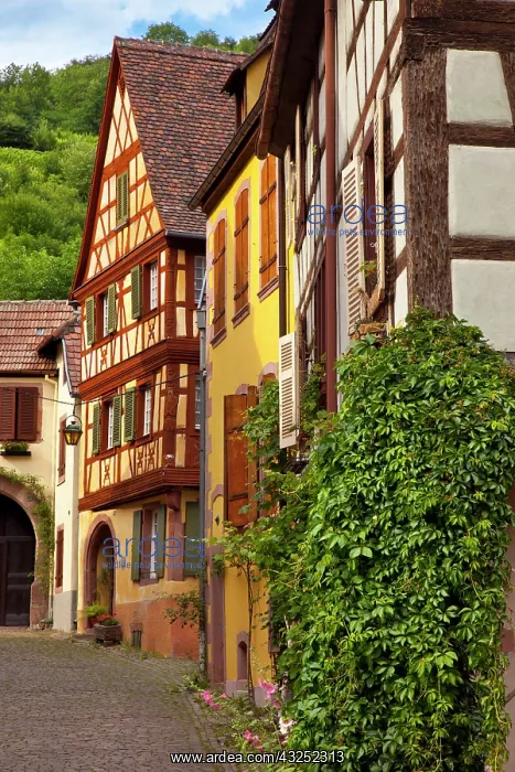 : Village street scene in Kaysersberg, along : Village street scene in Kaysersberg, along
