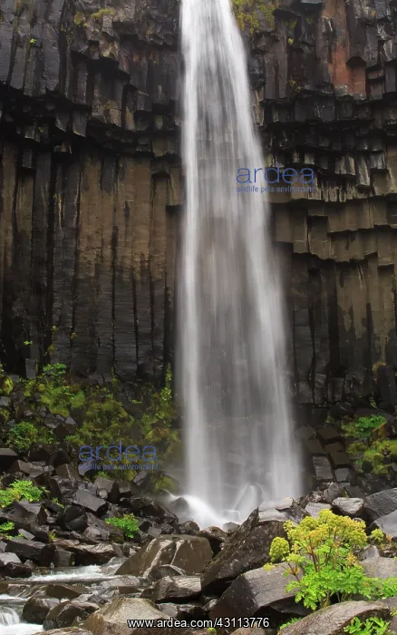 : Waterfall over a basaltformation : Waterfall over a basaltformation