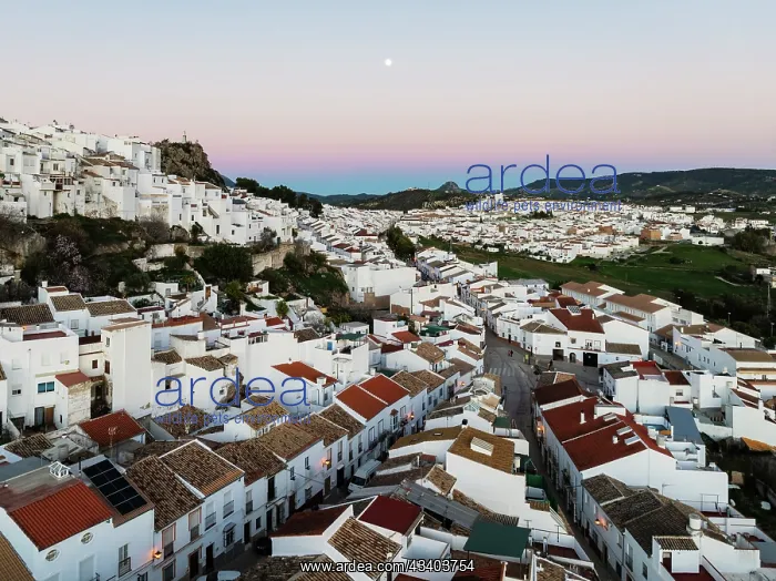 : The White Town of Olvera with full moon at dusk : The White Town of Olvera with full moon at dusk