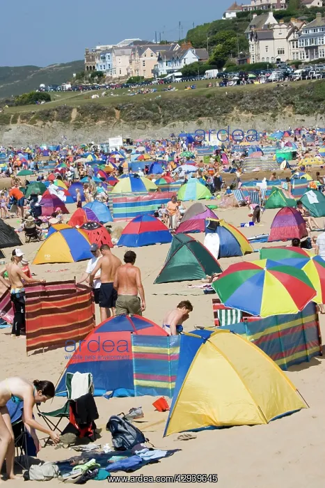 : Woolacombe, Devon, UK - Holidaymakers with tents : Woolacombe, Devon, UK - Holidaymakers with tents
