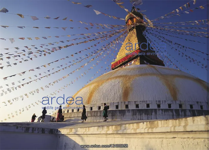 : Worshippers parade around the Great Stupa in the : Worshippers parade around the Great Stupa in the
