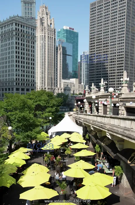 : Yellow umbrellas at cafe at Riverwalk along the Chicago : Yellow umbrellas at cafe at Riverwalk along the Chicago