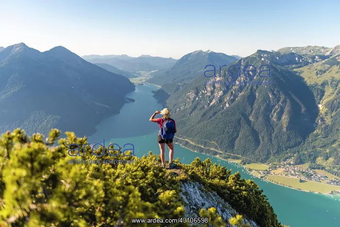 : Young hiker, woman looking into the distance, view : Young hiker, woman looking into the distance, view