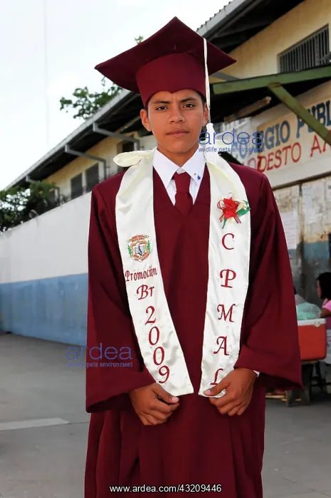 : Young man at graduation, just before the big graduation : Young man at graduation, just before the big graduation