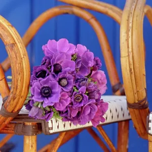 80202472 Bunch of flowers on wicker chair Frederic 80202472 Bunch of flowers on wicker chair Frederic