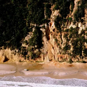 Australia - Four-wheel driving beneath sand cliffs Australia - Four-wheel driving beneath sand cliffs