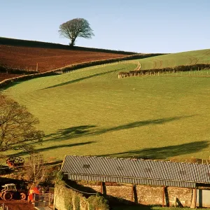 FARMING - Farm landscape with tractor and muckspreader FARMING - Farm landscape with tractor and muckspreader
