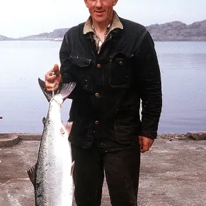 FISHERMAN - holding Salmon FISHERMAN - holding Salmon