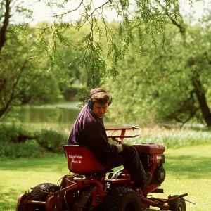 GARDENING - Mowing grass with mini-tractor GARDENING - Mowing grass with mini-tractor