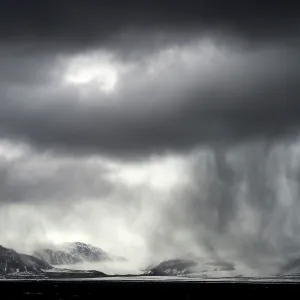 Mountains and Coastline with stormy weather
