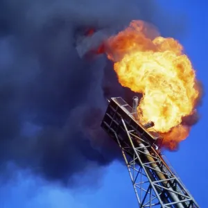 Oil Field / Rig - gas flare / flame Oil Field / Rig - gas flare / flame