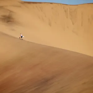 Sandboarding in the Namib Desert Sandboarding in the Namib Desert