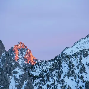 Snowy Mountains illuminated by the sun