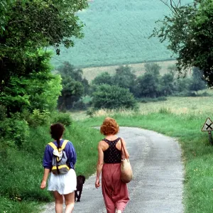 Walkers - two women on country road Walkers - two women on country road