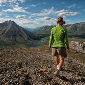 Woman Hiker / Walker hiking in wilderness mountains Woman Hiker / Walker hiking in wilderness mountains