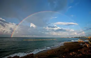 Rainbows: 180 degree rainbow after early morning storm
