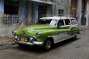 Dilapidated: 1950's era antique car and street scene