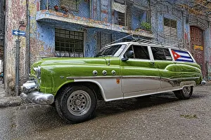 Dilapidated: 1950's era antique car and street scene