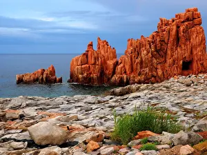 Porphyry: 80180293 Red Porphyry Rocks - in sunset glow with