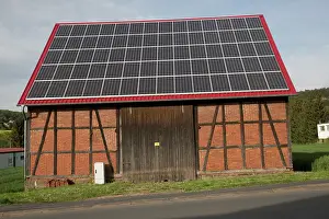 Half: 80183346 Solar PV Roof - on old half-timbered barn