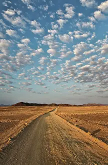 Isolation: 80183575 Gravel Road - in an arid plain with isolated