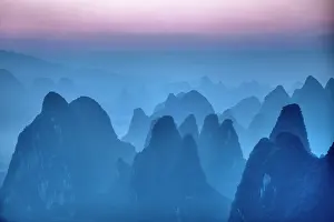 Guilin: 80185316 Limestone Karst Formations at dawn Guilin